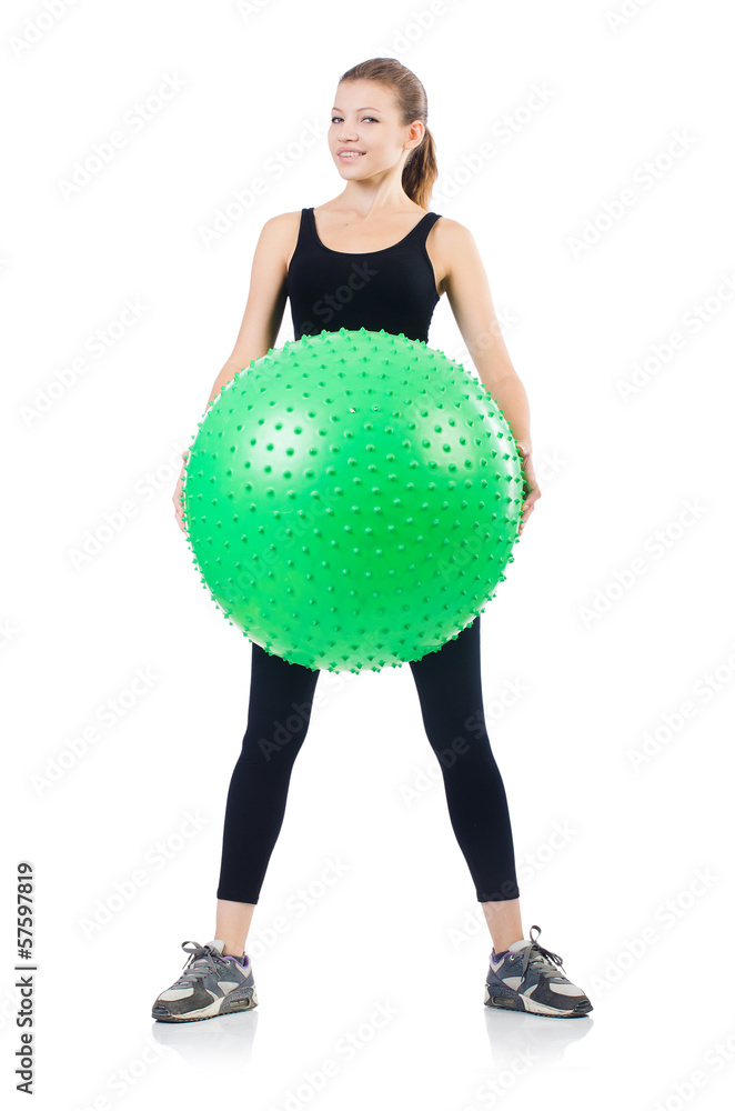 Woman exercising with swiss ball on white Woman exercising with swiss ball on white