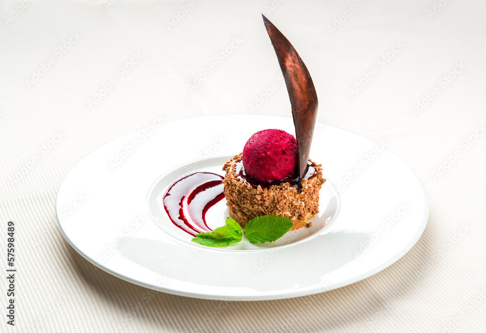 Delicious chocolate dessert with cherry ice-cream on a plate - obrazy, fototapety, plakaty 