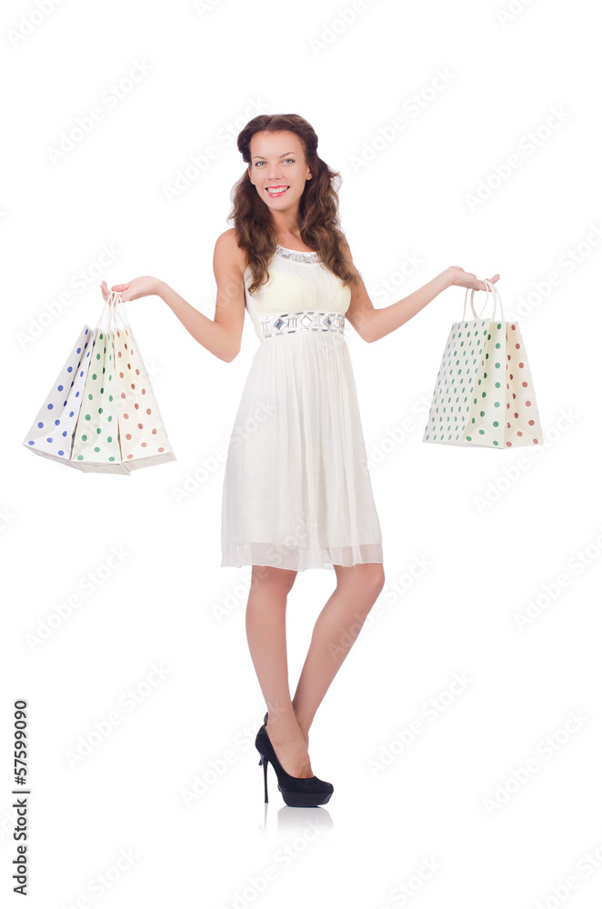 Girl after good shopping on white