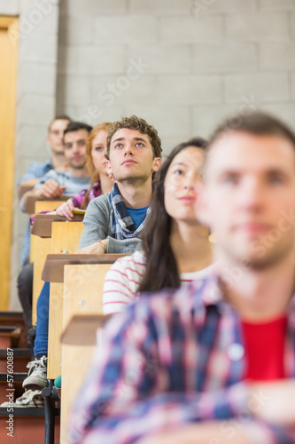 Close-up of young students sitting in classroom
