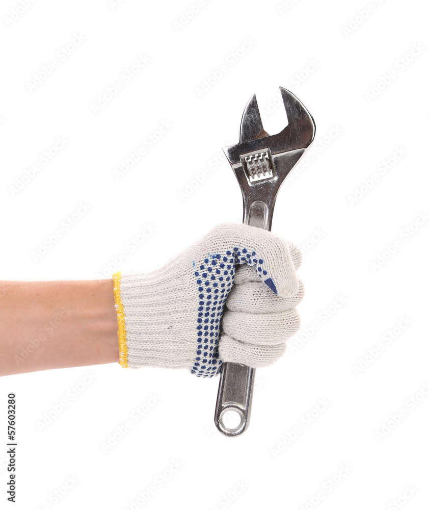Obraz premium Wrench in red gloves.