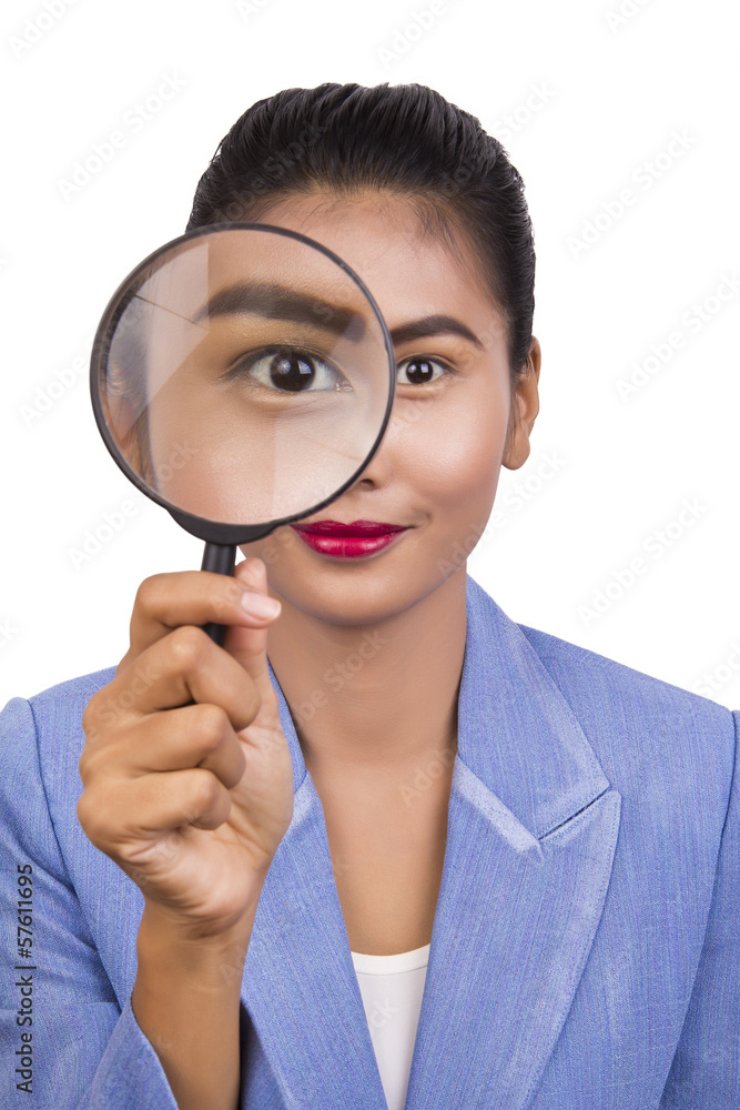 Business woman with a magnifier. Business woman with a magnifier.