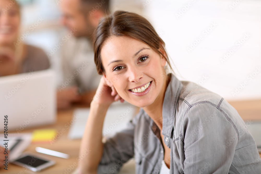 Young woman attending business training class Young woman attending business training class