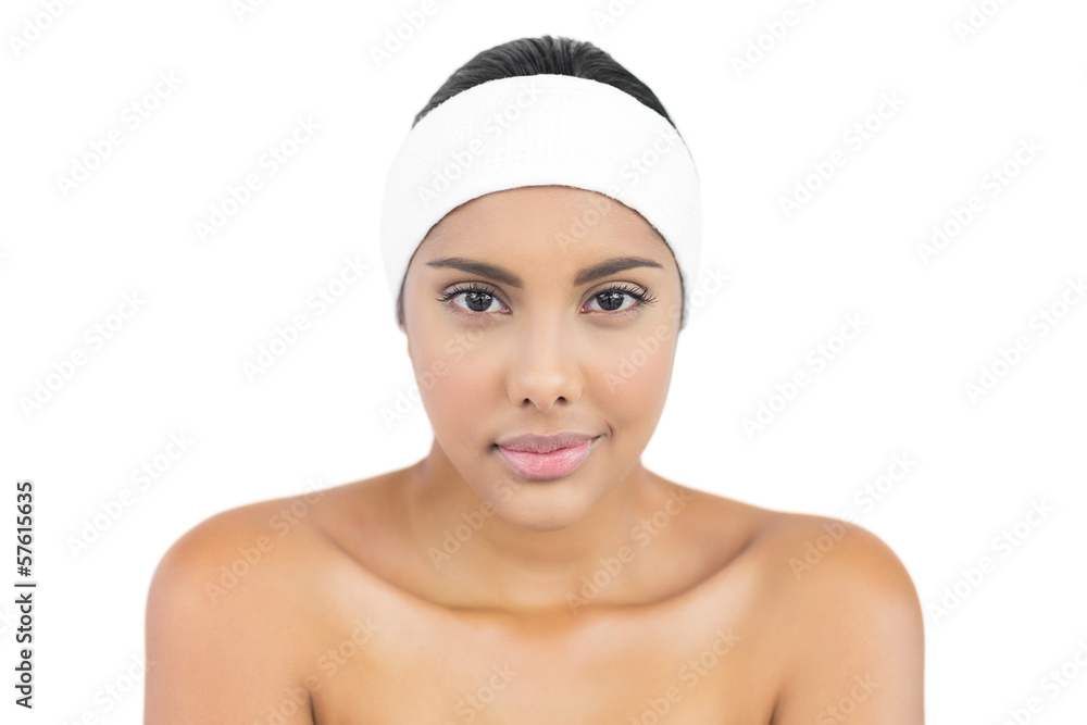 Pleased nude brunette with hairband looking at camera Pleased nude brunette with hairband looking at camera