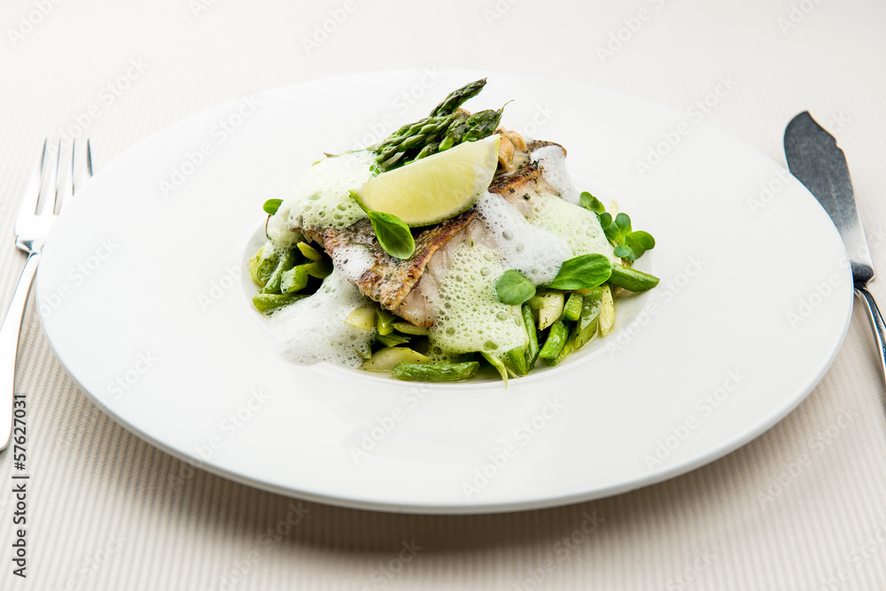Sea bass fillet with asparagus infused with sauce foam Sea bass fillet with asparagus infused with sauce foam