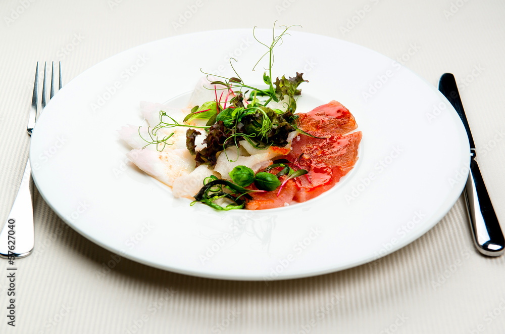 Cold appetizer, slices of trout and herring Cold appetizer, slices of trout and herring
