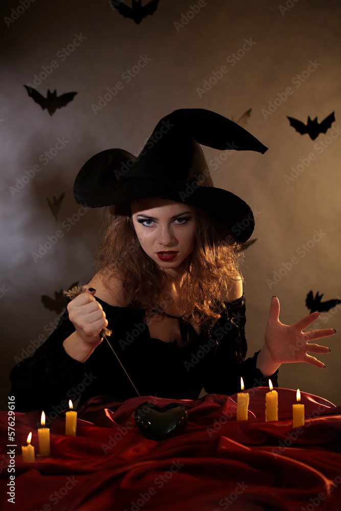 Fototapeta premium Halloween witch on dark background