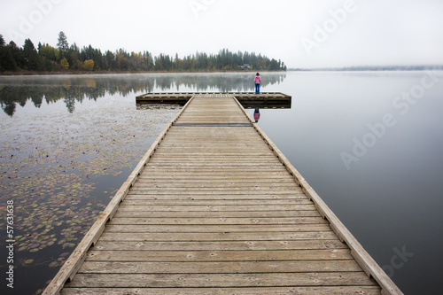 Child on end of the dock.