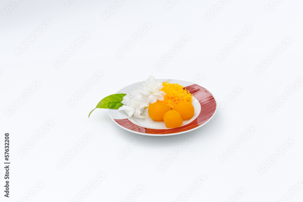Golden fibers and golden drops, Thai desserts on white backgroun Golden fibers and golden drops, Thai desserts on white backgroun