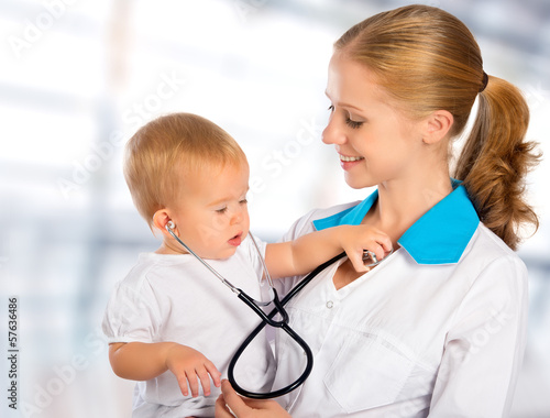 doctor pediatrician and patient happy child baby photo