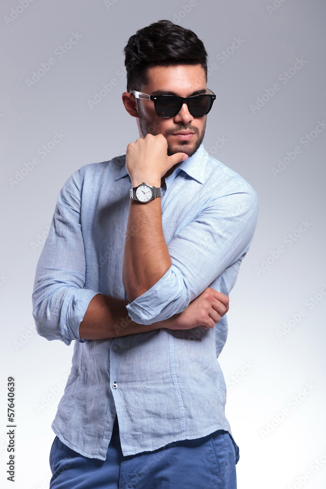 Obraz premium pensive casual man looks away