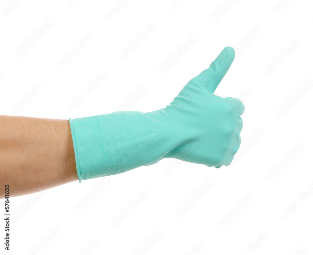 Hand shows thumb up in rubber glove. Hand shows thumb up in rubber glove.