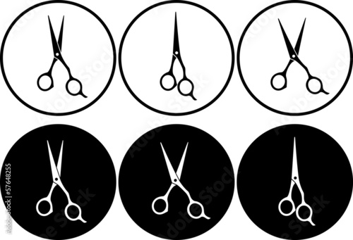 set of professional scissors in round frame