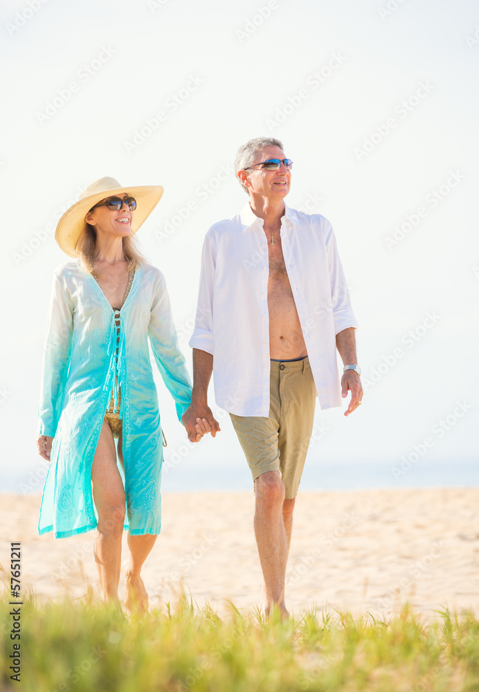 Romantic Couple Walking on the Beach Romantic Couple Walking on the Beach