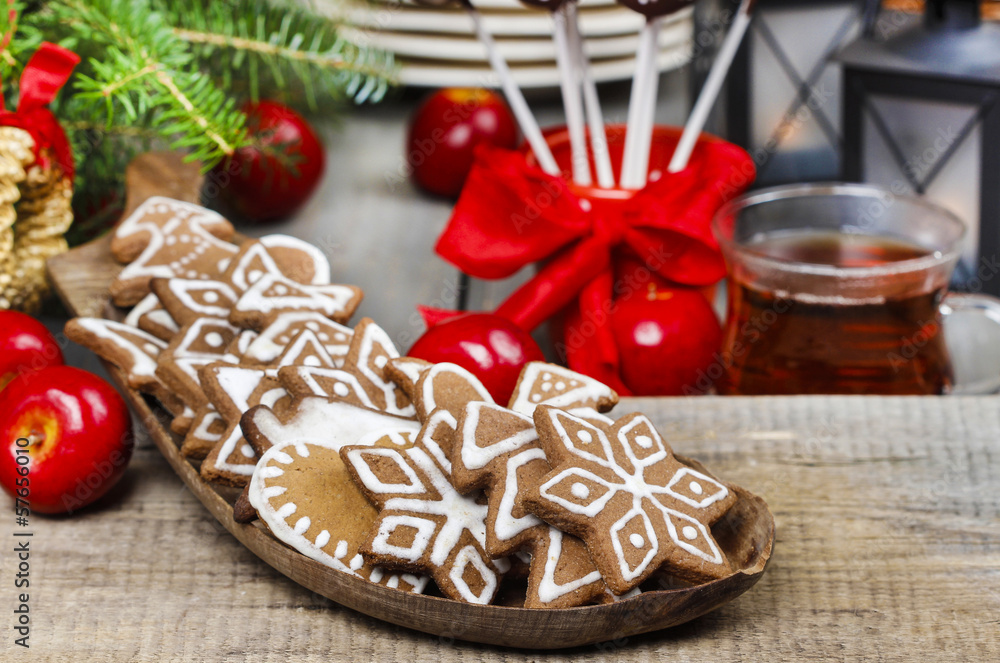 Christmas gingerbread cookies on wooden tray. Selective focus