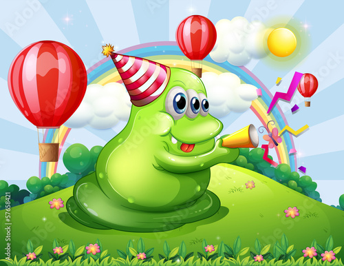 A giant monster at the hilltop with a party hat