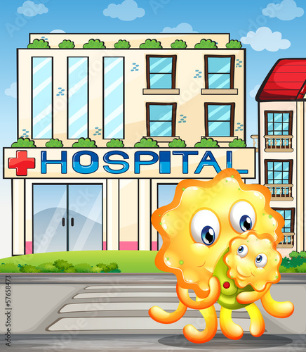 A mother monster and her child in front of the hospital