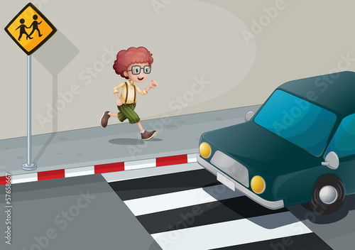 A boy running near the pedestrian lane
