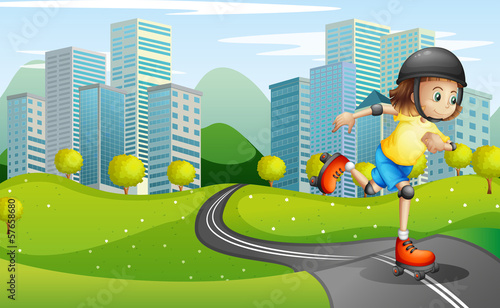 A girl rollerskating at the road with a safety helmet