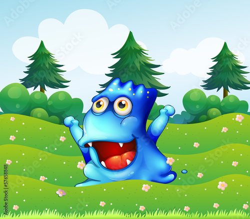 A happy blue monster near the pine trees
