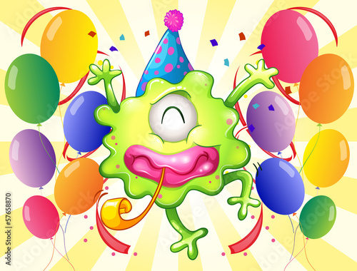 A happy monster in the middle of the balloons