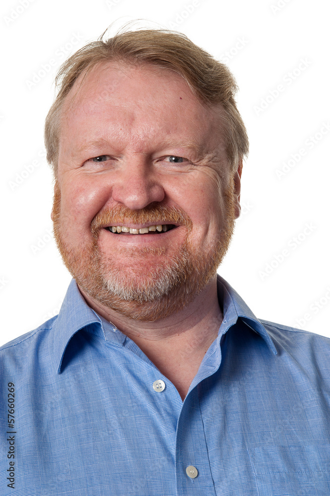 Smiling middle aged bearded guy in blue shirt - on white Smiling middle aged bearded guy in blue shirt - on white