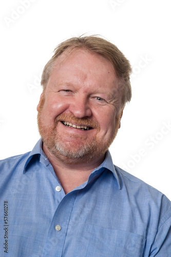 Friendly middle aged bearded guy in blue shirt - on white