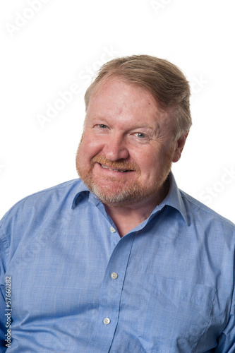 Friendly middle aged bearded guy in blue shirt - on white