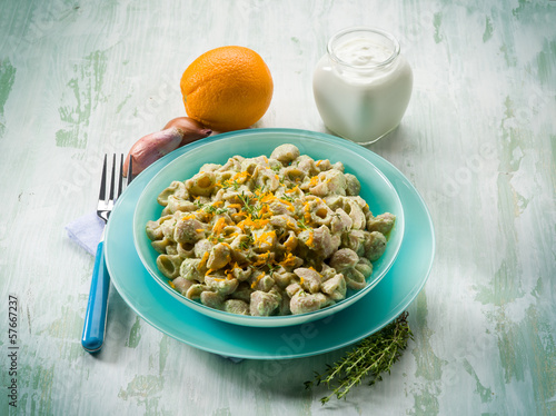 pasta with artichoke cream and orange peel photo