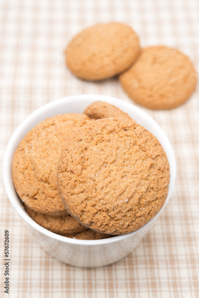 delicious oatmeal cookies in a bowl, top view delicious oatmeal cookies in a bowl, top view