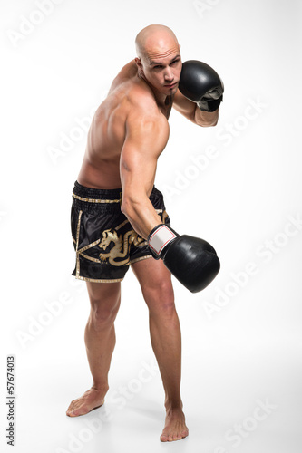 junger Mann beim Kampfsport Thaiboxen Stock Photo | Adobe Stock