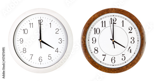 Two clock faces showing four o'clock