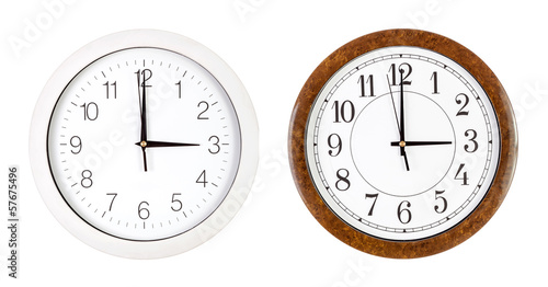 Two clock faces showing three o'clock