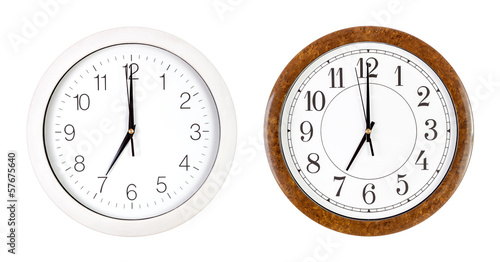 Two clock faces showing seven o'clock