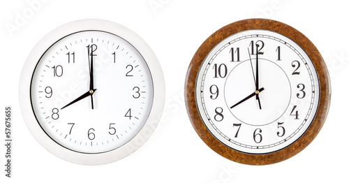 Two clock faces showing eight o'clock