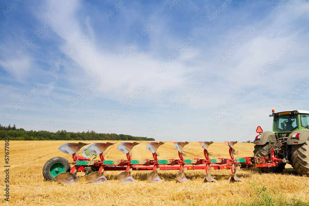 Agriculture tractor ready to plow a stubble field Stock Photo Adobe Stock