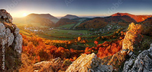 Fototapeta Naklejka Na Ścianę i Meble -  Autumn panorama with sun and forest, Slovakia