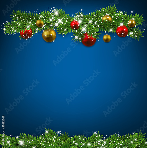 Christmas blue background with fir branches.