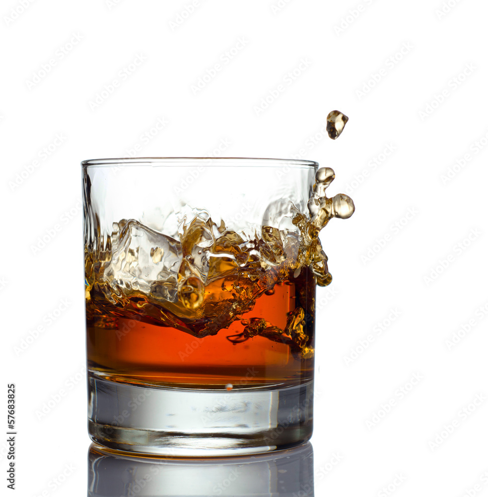 whisky splash isolated on a white background whisky splash isolated on a white background