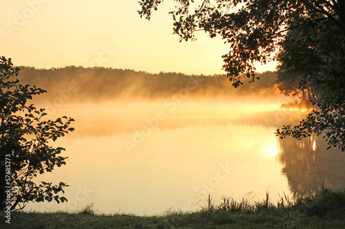 foggy lake at sunrise