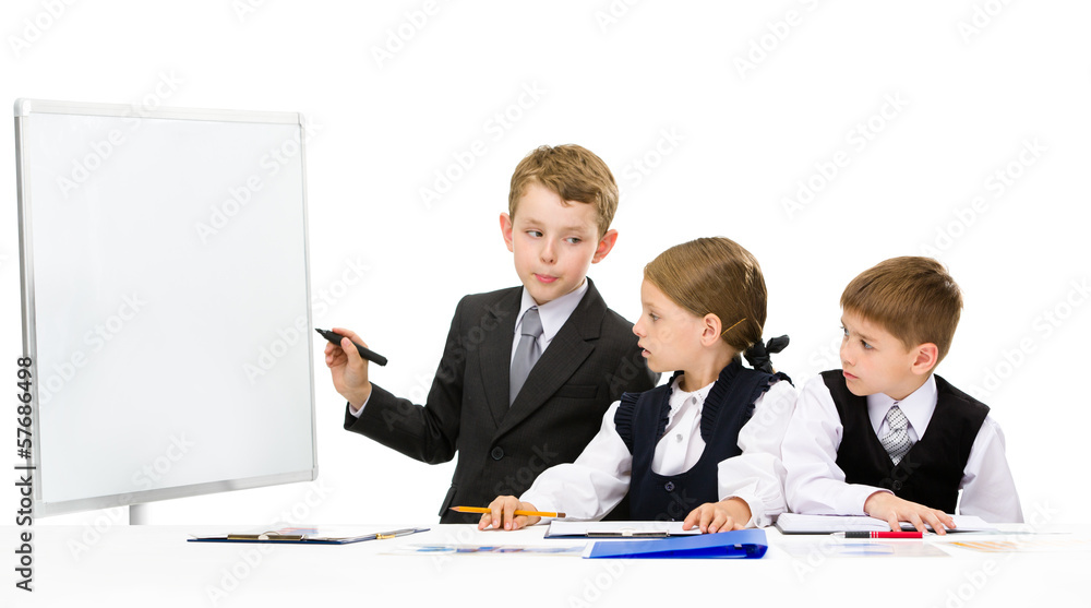 Little businessman showing something on screen Little businessman showing something on screen
