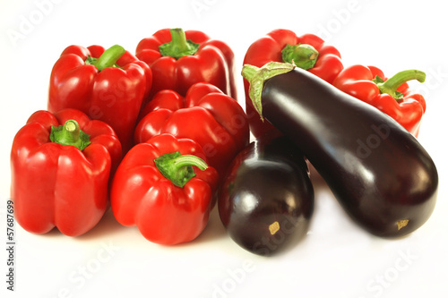 Isolated aubergines and paprikas