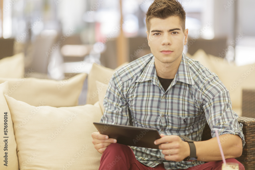 Young man with tablet Young man with tablet