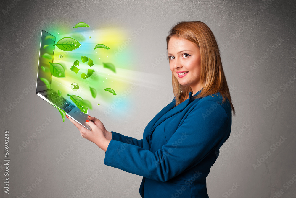 Casual woman holding notebook with recycle and environmental sym Casual woman holding notebook with recycle and environmental sym