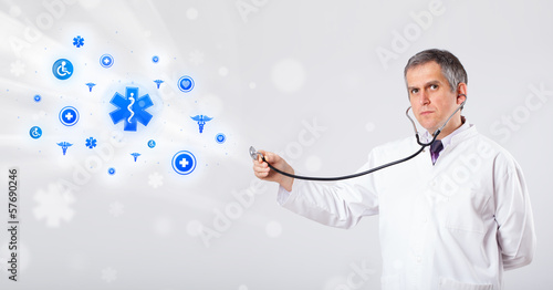 Doctor with blue medical icons photo