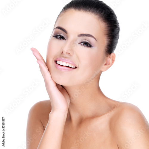 Beautiful face of smiling woman with clean fresh skin