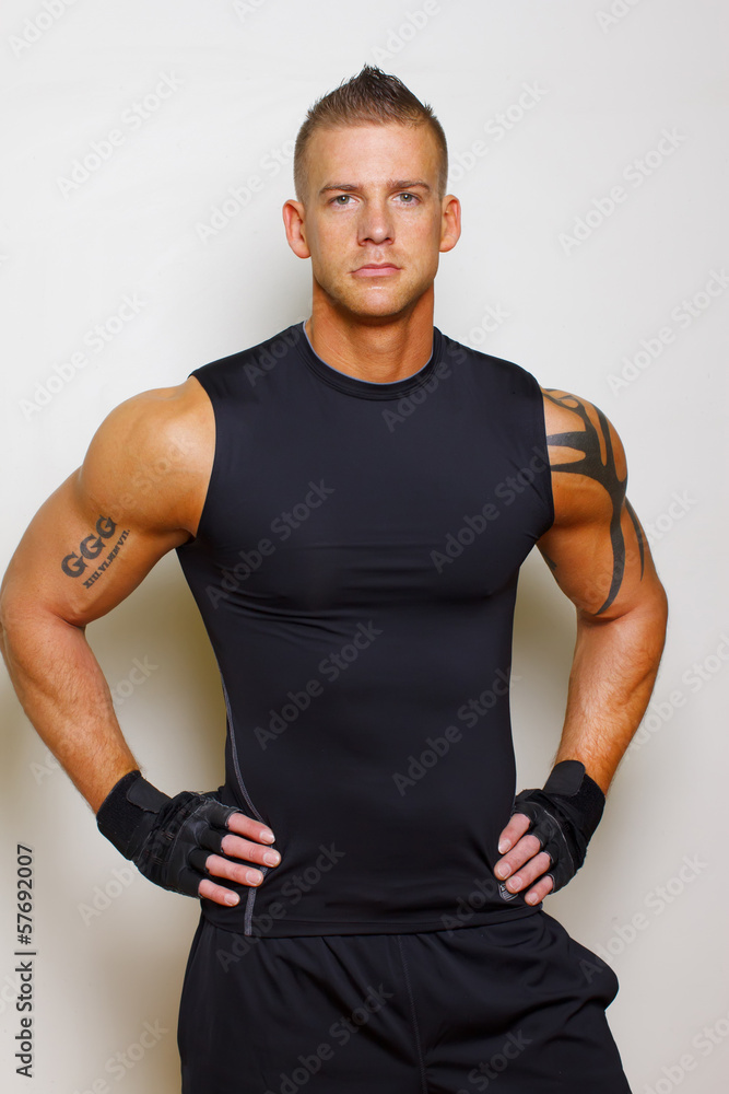 Young sportsman on a white background Young sportsman on a white background