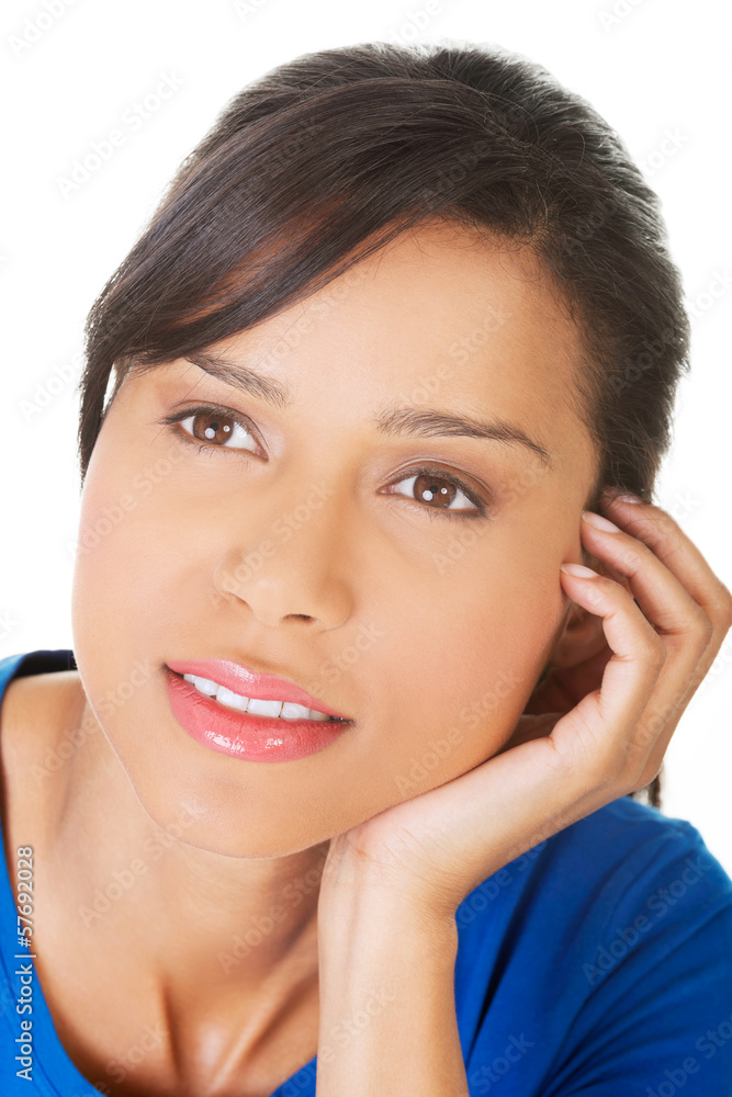 Beautiful woman's face in a closeup while thinking. Beautiful woman's face in a closeup while thinking.