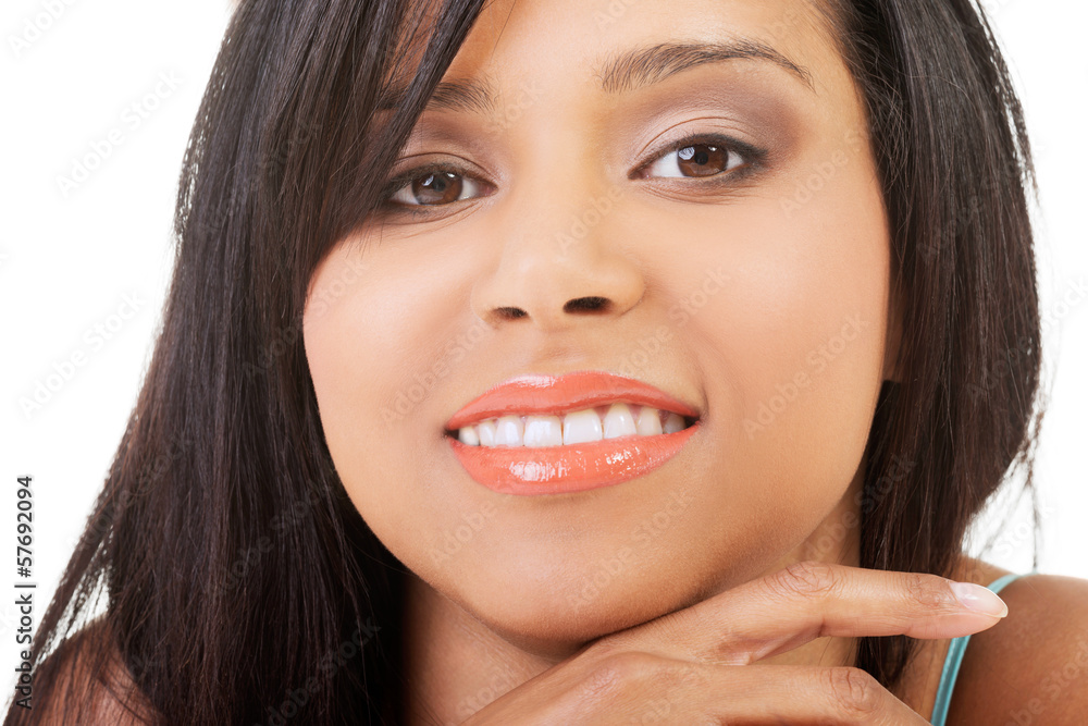 Beautiful woman's face in a smile. Beautiful woman's face in a smile.