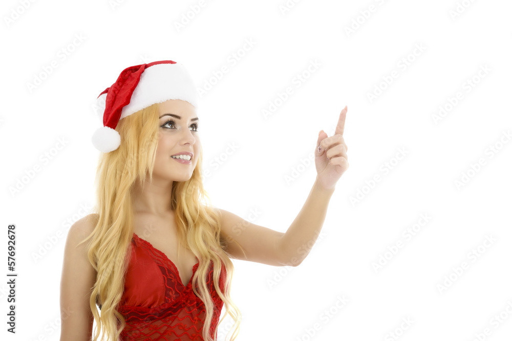 Beautiful smiling christmas santa woman pointing up showing copy Beautiful smiling christmas santa woman pointing up showing copy